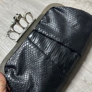 Black leather knuckle clutch